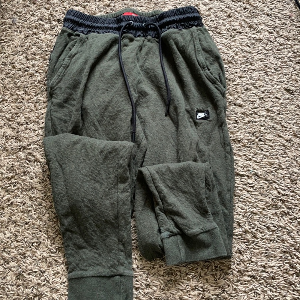 Green Nike joggers